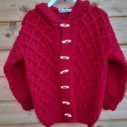 Hand Knitted Childs Aran Style Hooded  Cabled Jacket with Wooden Toggles. - Image 4